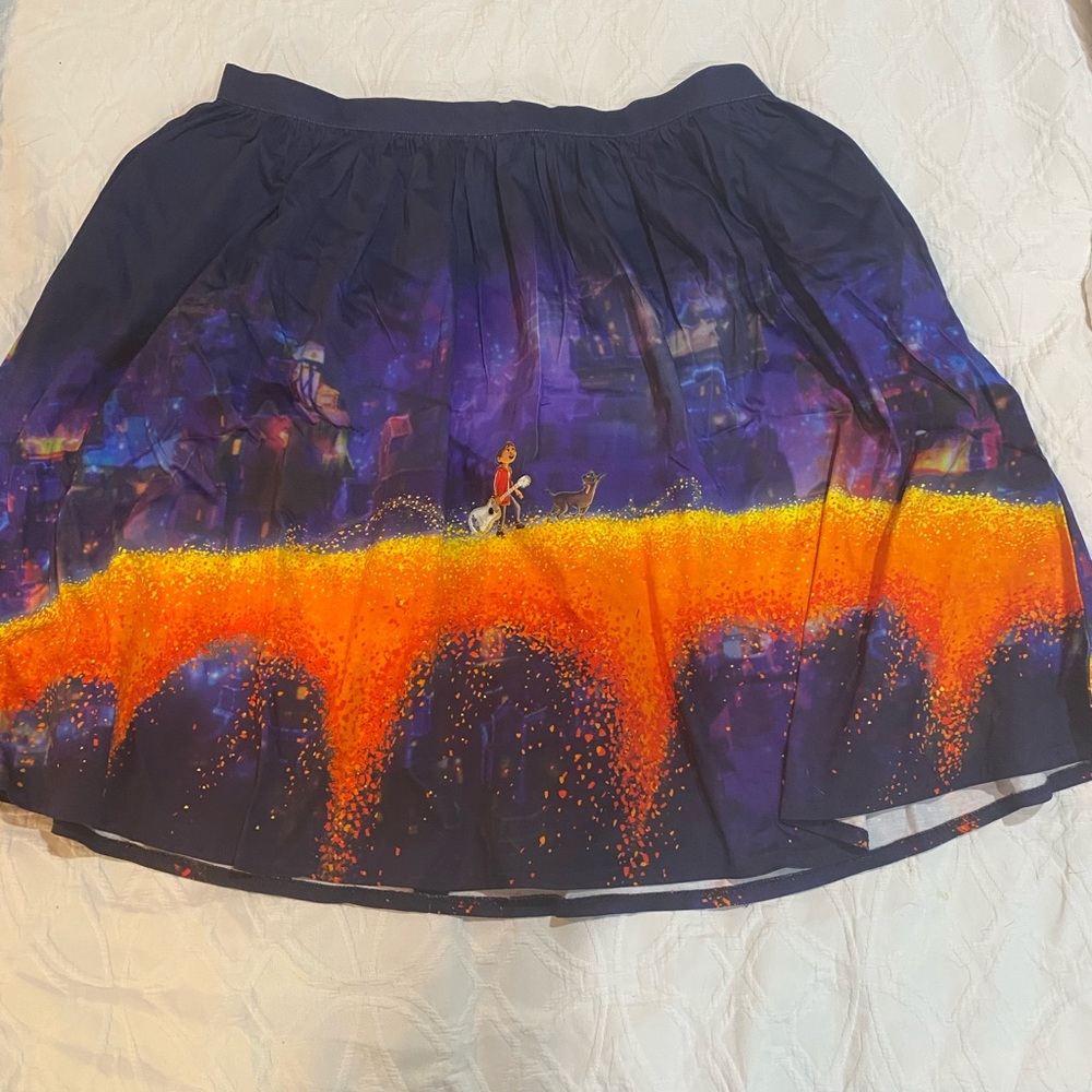 LOUNGEFLY PIXAR STITCH SHOPPE COCO MARIGOLD BRIDGE “SANDY” SKIRT